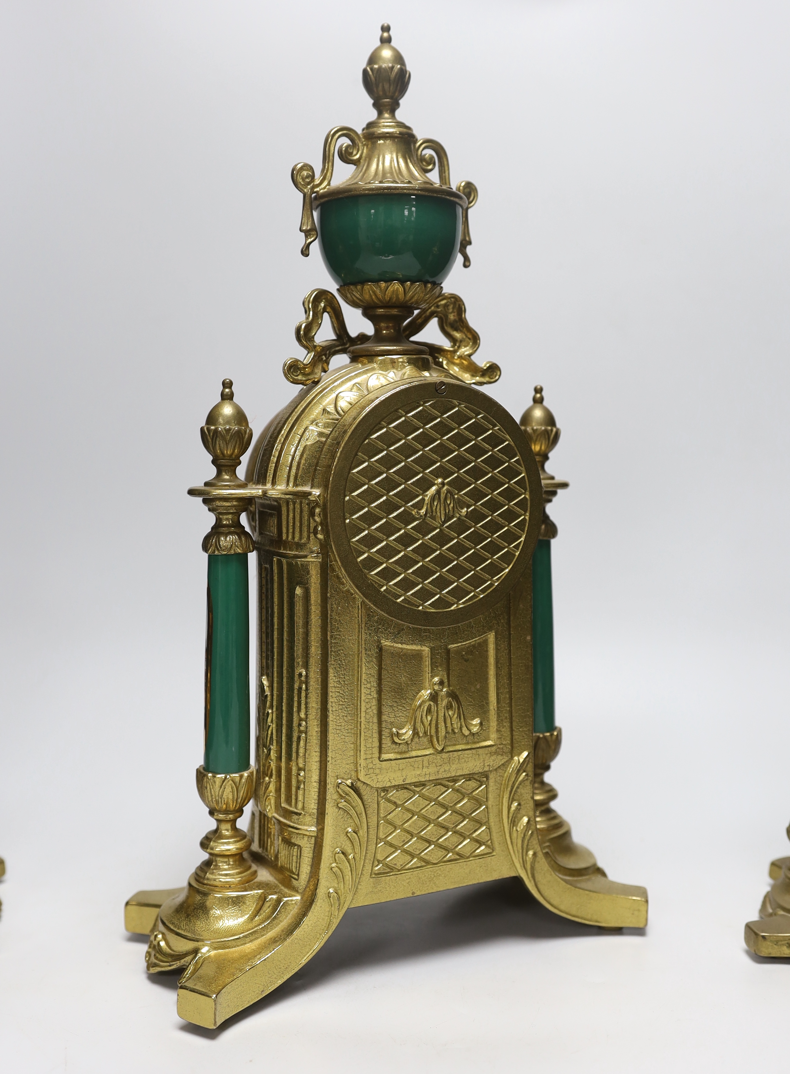 A three piece brass and porcelain clock garniture, clock 43cm high